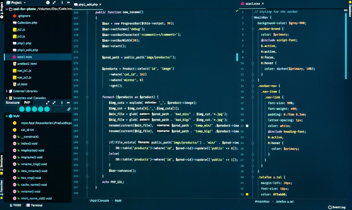 Css and php code on dark blue background in the code editor, close up. Splitting of php and css code, front view